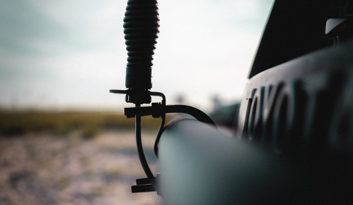 Midland MXATMT1 bull bar mount with antenna installed on bumper | Right Channel Radios